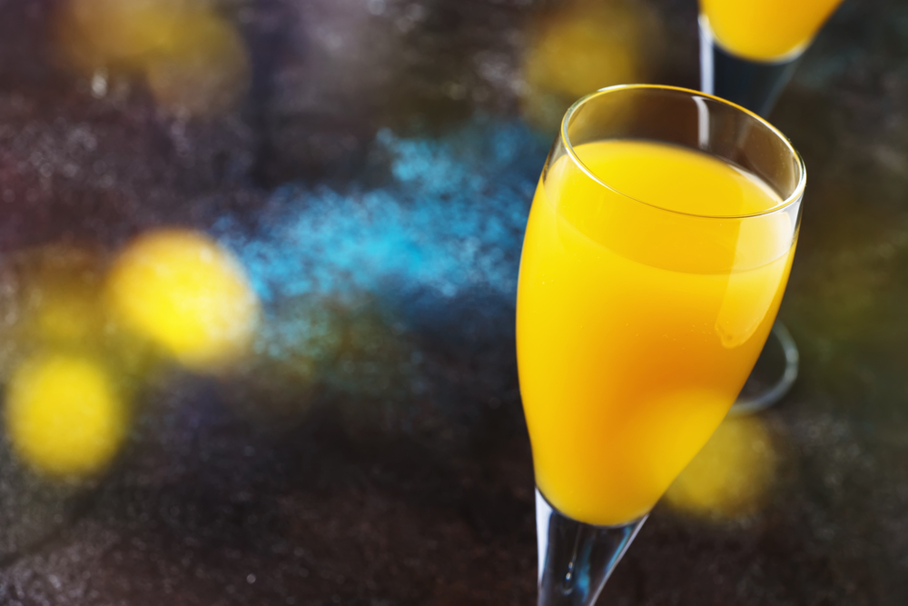 champagne flute with mimosa