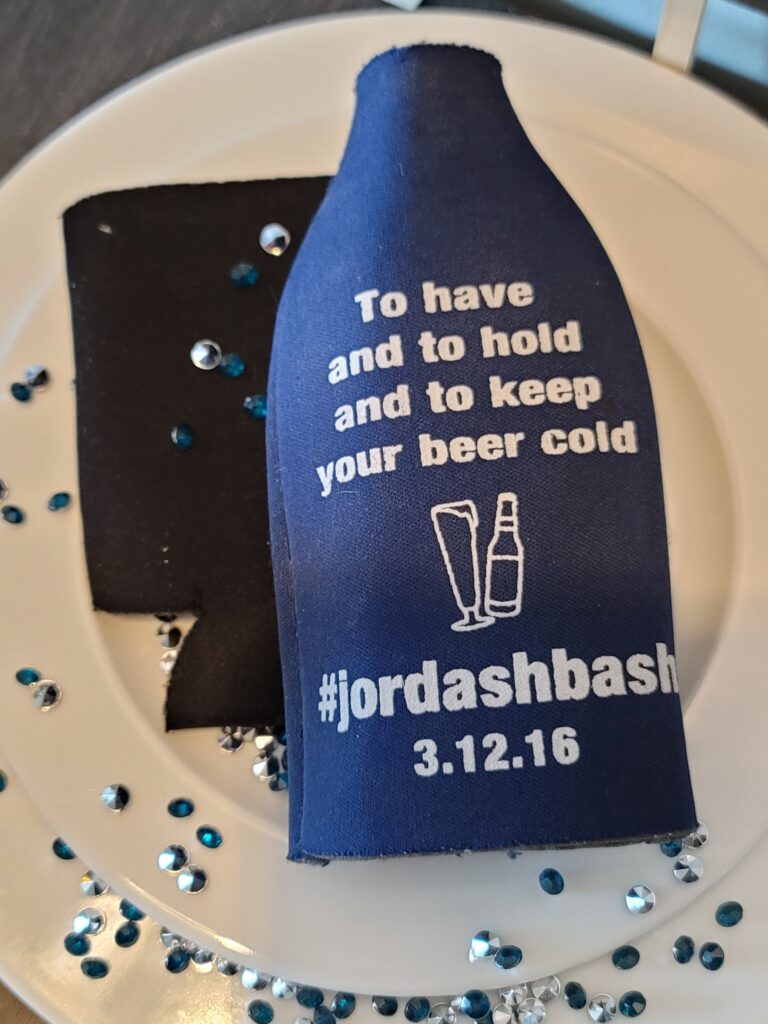 Wedding Bottle Koozie on a plate with glitter
