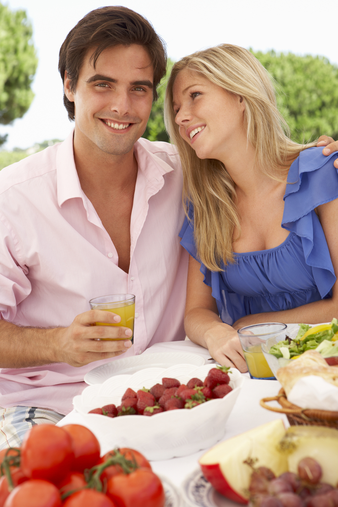 Young couple enjoying brunch and low sugar cocktails