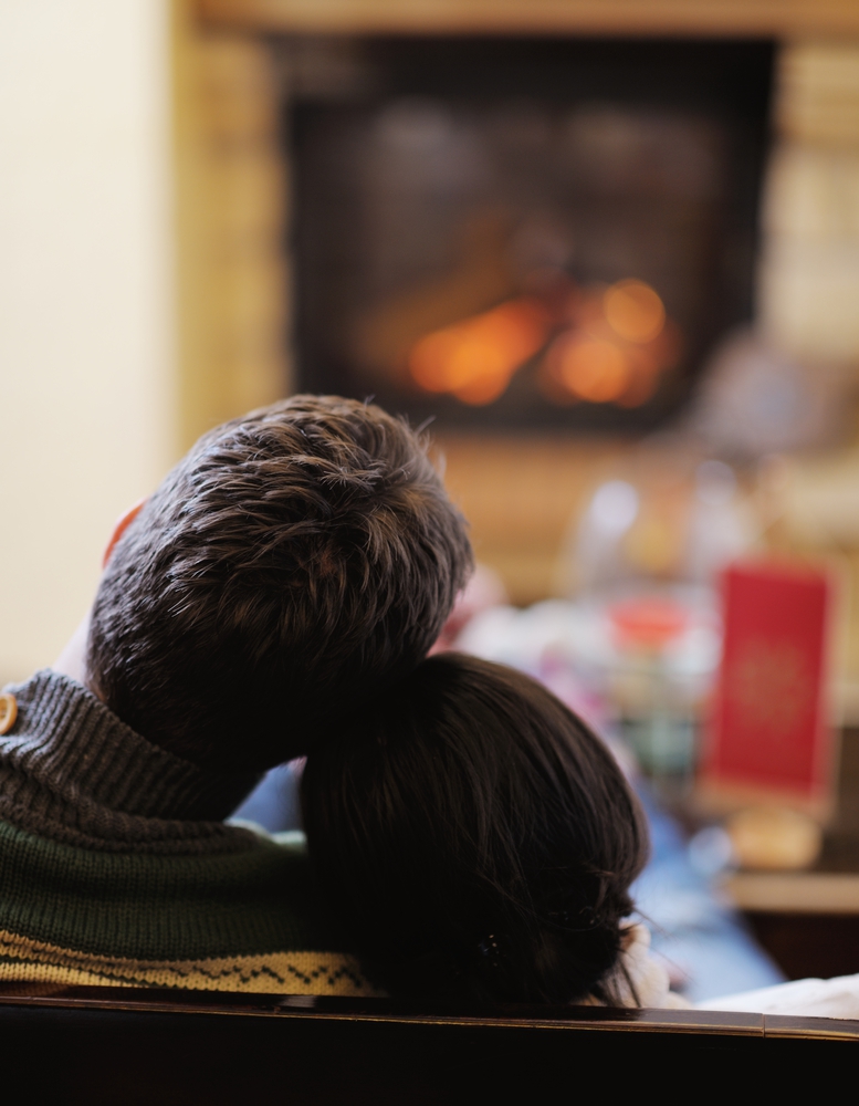 Couple Drinking Spanish Coffee Cocktail In Front Of Fire