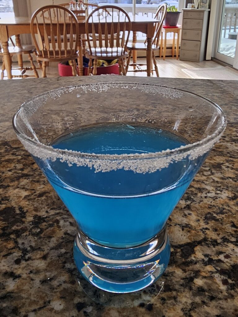 Lions Kool-Aid Martini with a sugar rim