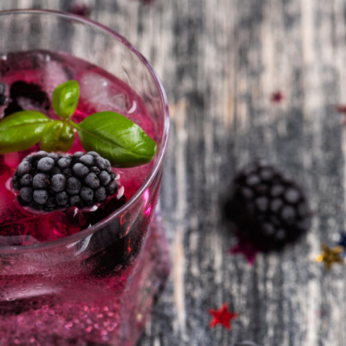 Blackberry Basil Mojito Cocktail with fresh blackberries and basil for garnish