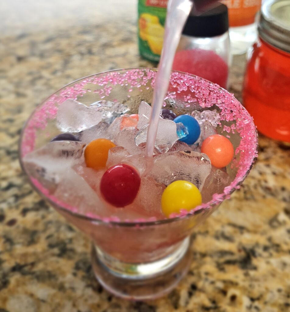 Hard Bubblegum Lemonade cocktail with gumballs for garnish