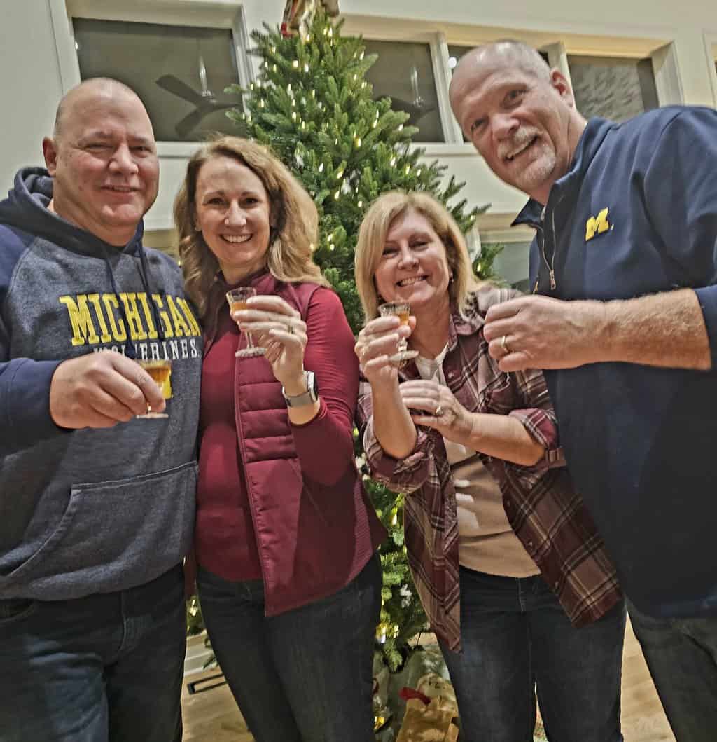 4 people toasting Viryta Honey Liqueur