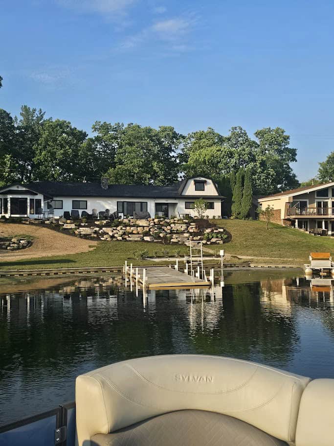 House under construction on a lake