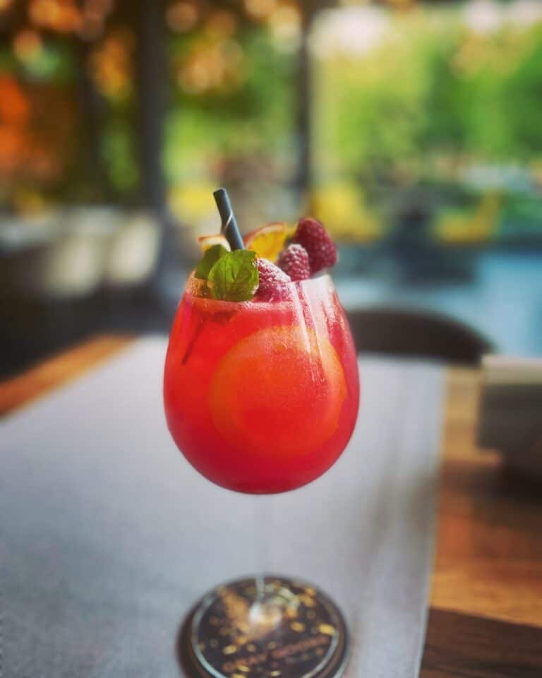 Crown Royal Cocktail with fruit in a wine glass