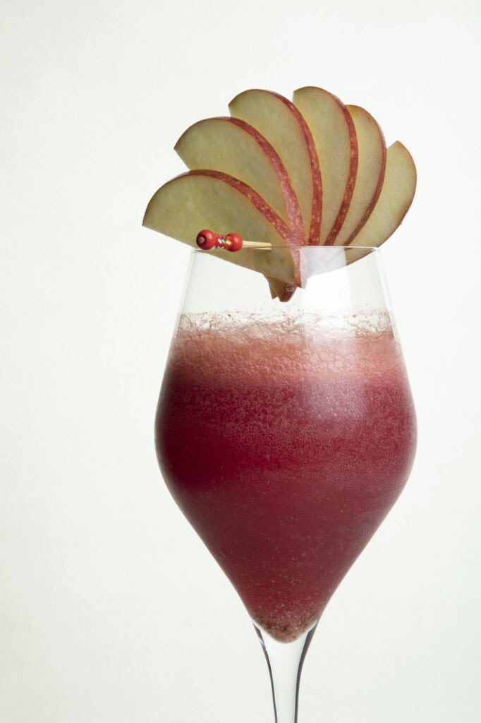 Red Cider Sangria with slices of apple on top