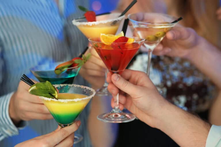 4 Martini glasses full of various Cocktails for World Cocktail Day