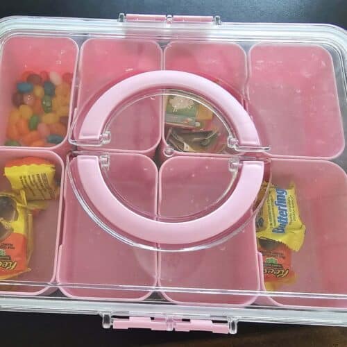 Pink Snackle Box with candy and prizes inside, 8 compartments